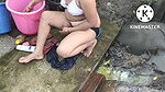 Indian house wife bathing in bra