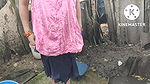 Indian house wife bathing outside