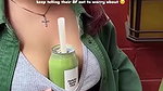 Sexy girl boobs enjoyed by boyfriend drinking juice