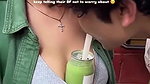Sexy girl boobs enjoyed by boyfriend drinking juice
