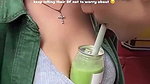 Sexy girl boobs enjoyed by boyfriend drinking juice