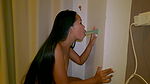 Hot Asian Beauty Sucks The Dildo On The Wall!