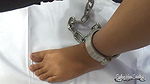 Pinay slave getting legs chained