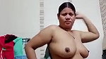 Hot milf aunty oiling her boobs after bathing