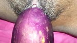 Bangladeshi girl gets excited and fucks her pussy with eggplant