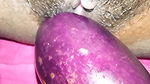 Bangladeshi girl gets excited and fucks her pussy with eggplant