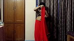 Bengali Lady sexy saree drape in red saree showing pierced fleshy navel 22
