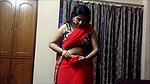 Bengali Lady sexy saree drape in red saree showing pierced fleshy navel 22