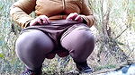 MILF in Tight Leggings Pees in Nature
