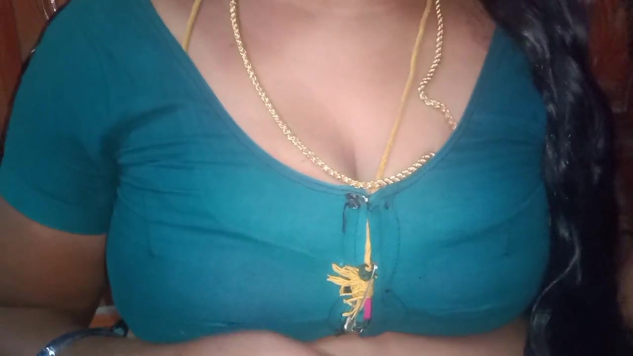 Tamil aunty squeezing her breasts when she is alone and unable to control her emotions.