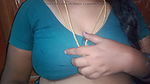 Tamil aunty squeezing her breasts when she is alone and unable to control her emotions.
