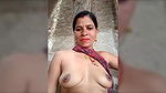 Village Bhabhi pressing her big boobs 22