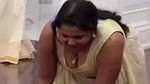 Malayali busty lady wide cleavage show in cream costume 22