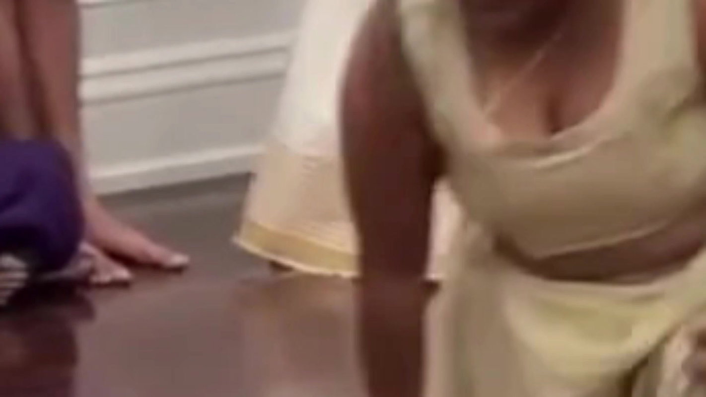 Malayali busty lady wide cleavage show in cream costume 22