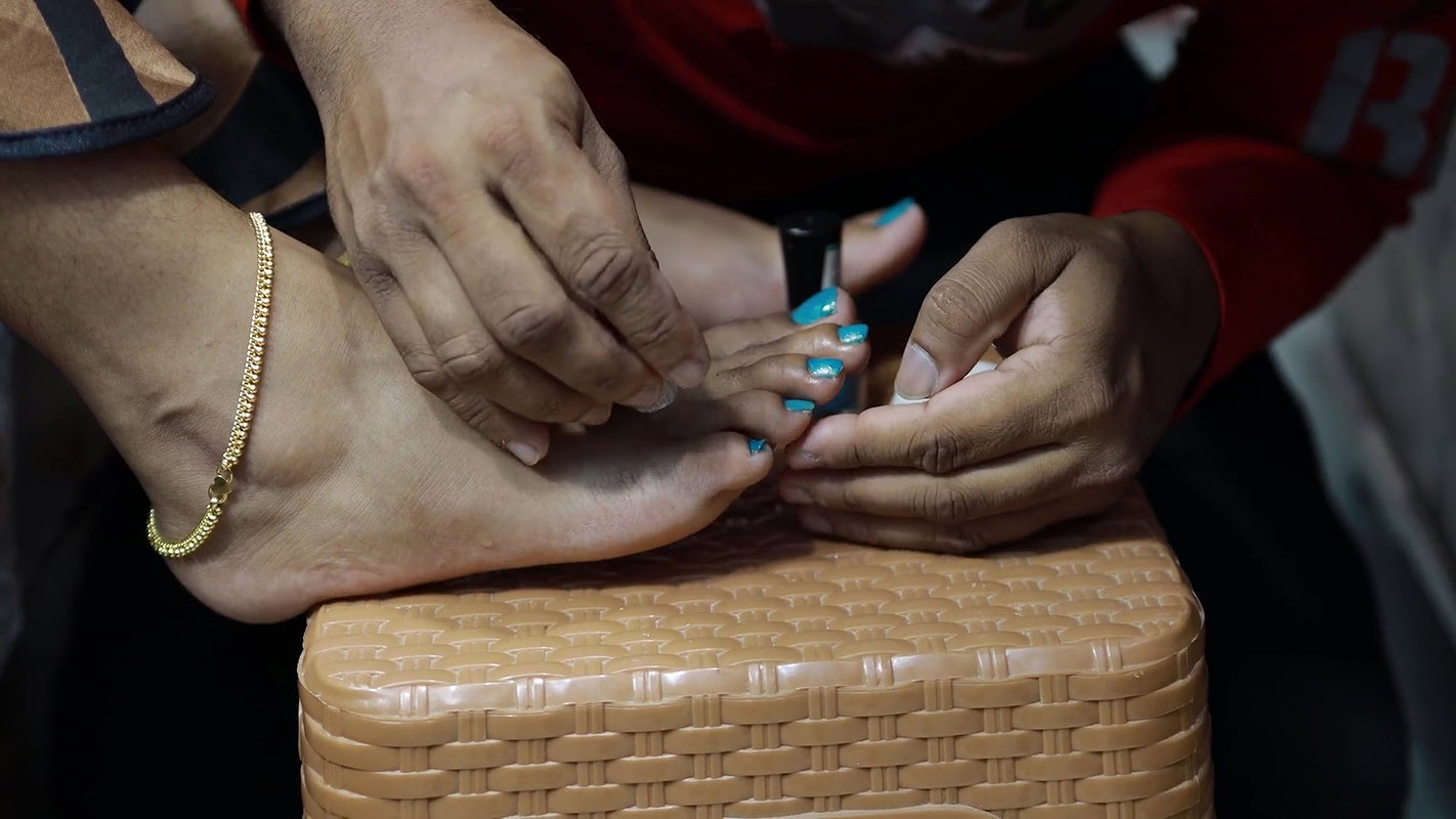 Boy Put Nail Polish on Girl Feet