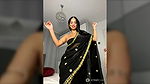 Beautiful Babe wearing Black Saree showing her beautiful body 22