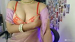 YOUNG DESI BHABHI IN SAREE seducing pressing boobs