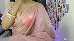 YOUNG DESI BHABHI IN SAREE seducing pressing boobs