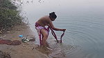 Indian Village Wife Bathing in the River in Outdoor Area