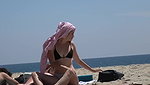 2 bikini babes’ round Ass and boobs captured by voyeur on beach.MP4