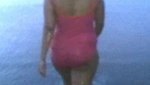 bhabhi walking at beach in swimwear