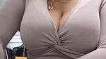 Busty MILF huge boobs and cleavage show in trial room
