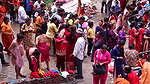 Multiple women wearing clothes after bath at ghat