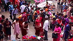 Multiple women wearing clothes after bath at ghat