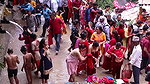 Multiple women wearing clothes after bath at ghat
