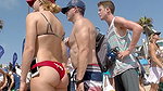 Plump round ass closeup caught by voyeur on beach (HD)