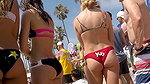 Plump round ass closeup caught by voyeur on beach (HD)