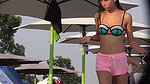 Young babe hot figure visible in small bikini