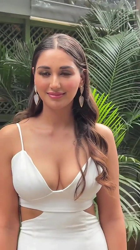 Nikita Dutta Trying to Hide Her Seductive Cleavage