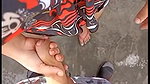 Beautiful girl handjob at public street