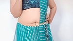 kruti Patel with net saree drapping with waist cha.