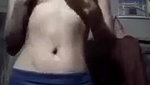 Village girl removing her kamiz
