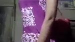 Village girl removing her kamiz