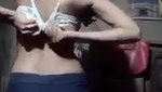 Village girl removing her kamiz