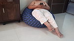 Indian wife sitting topless with the door open.