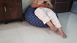 Indian wife sitting topless with the door open.