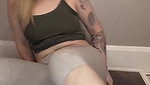 Hot sexy blonde girl in grey leggings fingering pussy and squirting on cam
