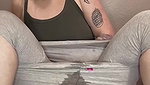 Hot sexy blonde girl in grey leggings fingering pussy and squirting on cam