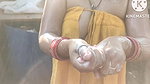 Anita yadav bathing outside with hot.