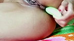 Desi bhabi alone at noon time got horny and started playing nude inserting cucumber in pussy.