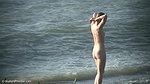 Sweaty Natasha walks naked on the beach_ba4a3b6f