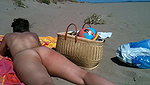 In her exclusive scene Nikki Sun mounts a trio with DP on the beach_320ffa86