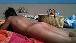 In her exclusive scene Nikki Sun mounts a trio with DP on the beach_320ffa86