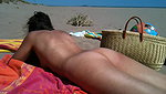 In her exclusive scene Nikki Sun mounts a trio with DP on the beach_320ffa86