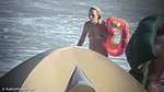LittleFeet Plays With Her Hole On The Public Beach_62ddf4b7