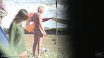 LittleFeet Plays With Her Hole On The Public Beach_62ddf4b7